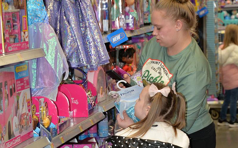 Cameron Mull was one of the 100 or so volunteers who stepped up to help Shop With A Cop December 9.