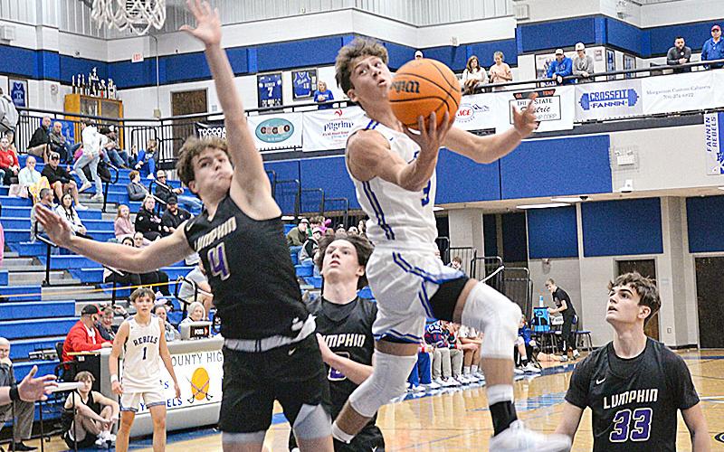 Fannin County’s Ben Bloch scored eight points for the Fannin County Rebels as they spoiled Rockmart’s perfect 12-0 season mark Friday, January 5, in the Rebel gym. Bloch is shown here in previous action for the Rebels.