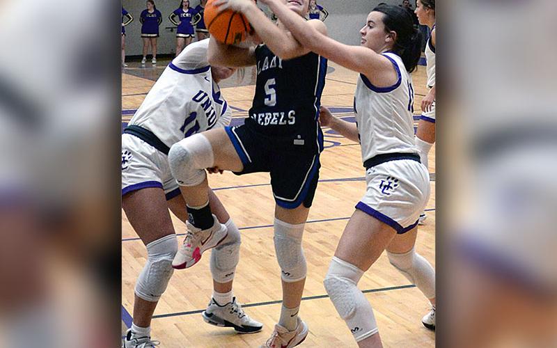 Callie Ensley (5) drives for two points against Union County Saturday.