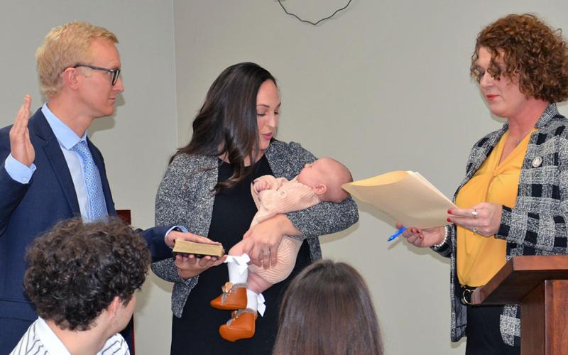 As her first official act as a Superior Court judge, B. Alison Sosebee administered the District Attorney Oath of Office to Frank Wood during a reception Friday at the Fannin County Courthouse. Wood’s wife, Kali, held a Bible and the couple’s young daughter, Madilyn, during the event. As chief assistant district attorney, Wood assumed the role of acting district attorney following Sosebee’s appointment.