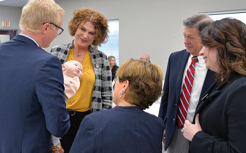 A Friday reception at the Fannin County Courthouse in Blue Ridge was held to honor new Superior Court Judge B. Alison Sosebee, but when District Attorney Frank Wood introduced young Madilyn Wood to the gathering, it’s easy to see that his new daughter stole the show. Gathered before the ceremony honoring Sosebee began are, clockwise from left, Wood, Madilyn, Sosebee, Senior Assistant District Attorney B. Morris Martin, Superior Court Judge Mary Beth Priest, and Chief Superior Court Judge Brenda Weaver.