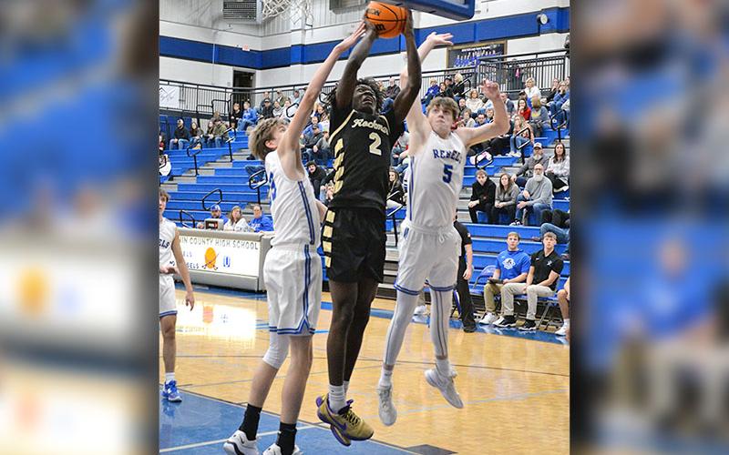 Fannin County’s Colton Kaylor (23) and Isaiah Angel (5) battle in recent action for the Rebels. Fannin’s recent win over Haralson moved the team into second place in Rebion 7AA