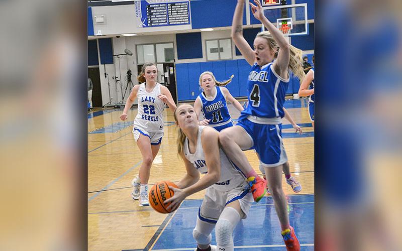 Callie Ensley took a hard foul as she went for two points for the Lady Rebels Earlier this season. She scored three points in the win over Rockmart.