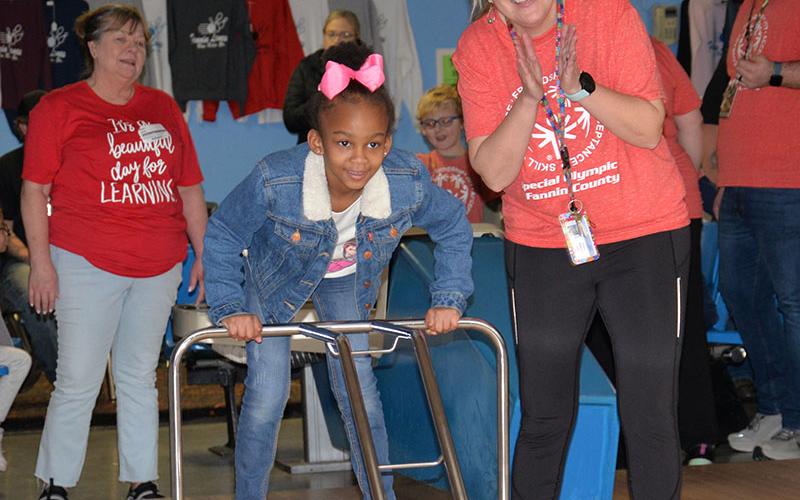 Gigi Gaulden from West Fannin Elementary is filled with excitement as she watches closely as her bowling ball makes its way down the alley.