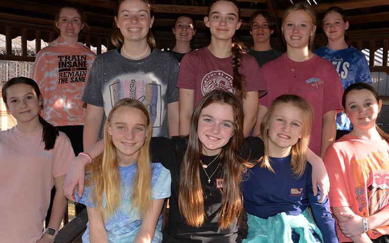 Members of the Fellowship of Christian Athletes at Fannin County Middle School loaded over 4,000 items for Fannin County’s homeless population into vehicles last week. Shown after helping with the work are, from left, first row: Jacquelyn Cline, Addison Head, Azalee Lunsford, and Ella Pace; second row: Lennox Patterson, Lillie Williams, Mallory Cline, Karleigh-Jayne Stiles;  and, third row,Claire Saxon, Addison Bradburn, Cash Goulah, and Sophia Carroll.