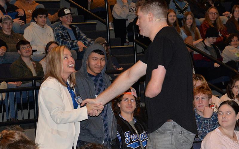 Kevin Atlas not only called on students, but also administrators during his presentation. Here, he meets with Curriculum Director Heather Collis. Atlas told students to listen to teachers when they are critical because they care about you.