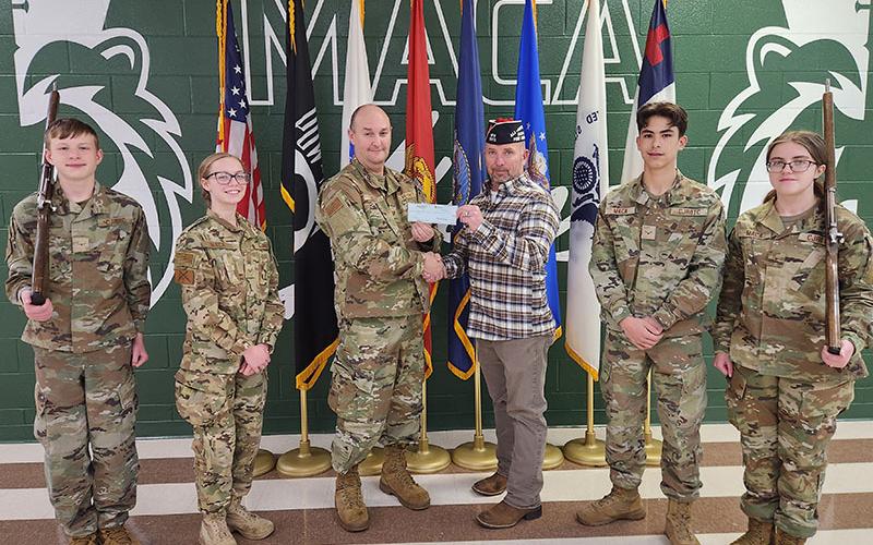 Veteran of Foreign Wars (VFW) Commander Harold Bargeron recently presented a check to Christian Junior ROTC Instructor Technical Sergeant John Tucker at Mountain Area Christian Academy. Shown during the presentation are, from left, Cadet Maxwell Scott, Cadet Alyha Hawkins, Tucker, Bargeron, Cadet Jacob Corley and Cadet Rebekah Pickelsimer.