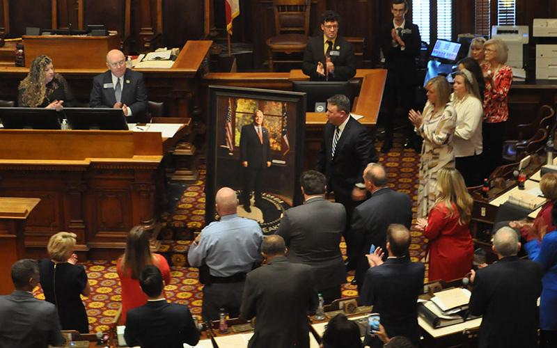 The House of Representatives Chamber in the state Capitol was filled last Thursday morning when a portrait honoring the late Speaker of the House and 7th District Representative David Ralston was unveiled. The portrait now hangs at the entrance to the Chamber to honor Ralston who served for 13 years as the 73rd Speaker of the House.