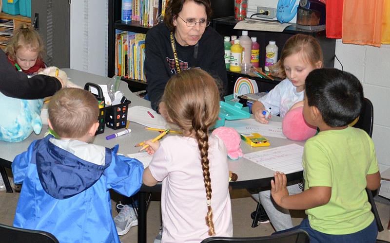 The students of Katie Ballew’s class are doing centers with their paraprofessional, Diane White during the local board training tour. Shown around the table from left to right are Andrew Davis, Annabelle Foraker, Anthony Vargas-Garcia, Journey Collis and White.
