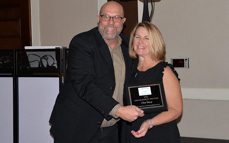 Char Stacy received the Chamber Ambassador of the Year award from Chamber Chairman Troy Shirbroun.