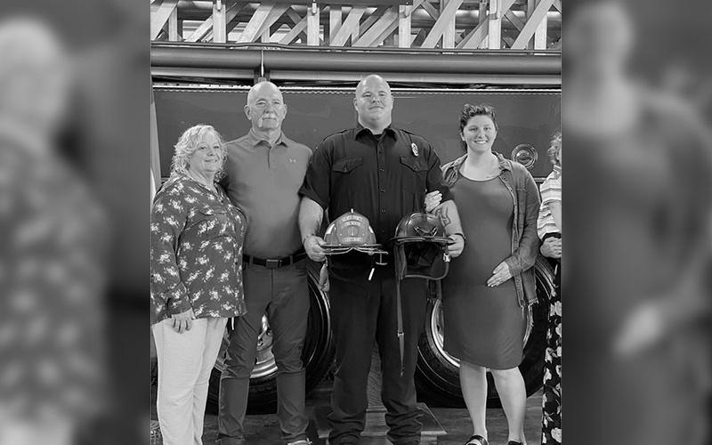 Geoffrey returned home after one season at Averitt to pursue his dream of becoming a professional firefighter. His family stands together supporting him, from left, mother, Rhonda Daves; father, Jerry Daves; Geoffrey Daves; wife, April Daves; and son, Payton Daves.