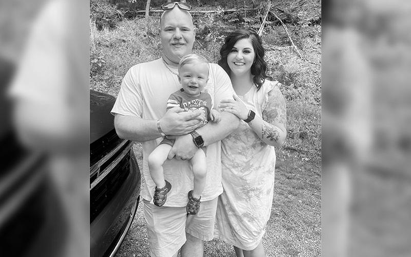 Geoffrey studied in an EMT program at North Georgia College and joined the Gilmer County EMT and Rescue in 2018. Geoffrey Daves holds son, Payton Daves, beside his wife, April Daves.