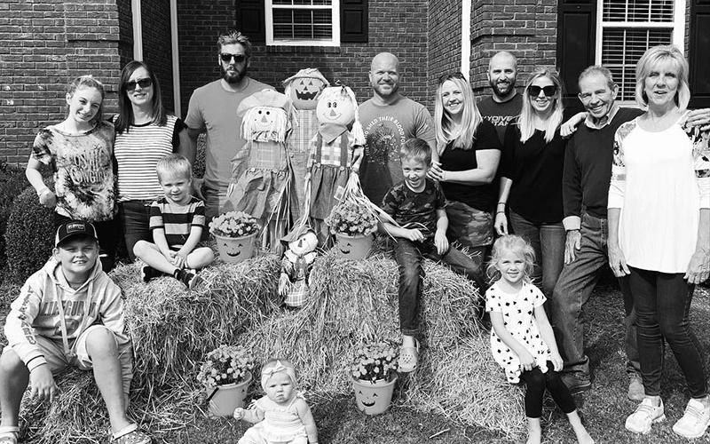 Rick and Sherry Thacker have three grown children and, to date, six grandchildren. Shown are, left, front, Banks Thacker, Beckett Laggis, Everett Stover and Georgia Grace Stover; sitting on the grass, Korey Laggis; back row, Berkeley Thacker, Carrie Thacker, Brandon Thacker, Chris Laggis, Whitney Laggis, Jonathan Stover, Lauren Stover, Rick Thacker and Sherry Thacker.