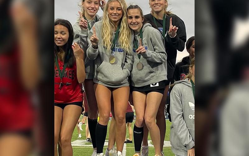 Fannin County High School’s 4x800 meter relay team of Lindsey Holloway, Ava Acker, Carlee Holloway and Karli Sams are shown on the podium after their first place finish at the Creek Invitational Meet.