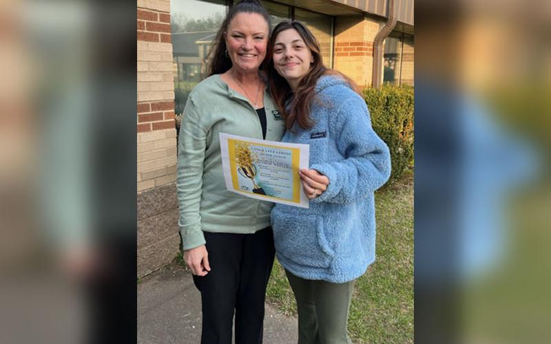 Ellie Carter, left, of the Fannin Mountain Education campus won the Georgia Young Author’s Fair in her grade level for the entire Mountain Education System. She is shown with her English teacher, Valerie Taylor.