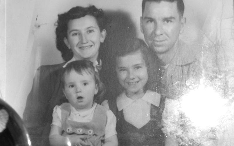 Bob and Betty Phillips hold their two daughters Cheryl Tipton, left, and Diane Pinkard. Sadly, Diane passed in 2010.