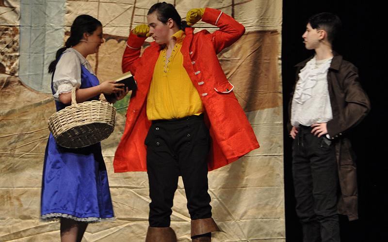 Abigail Ridings and Caden Gerald play Belle and Gaston in the Fannin County High School Drama Department  production of Beauty and the Beast that begins Friday night on the school campus.