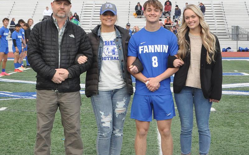 The Fannin County Soccer team recognized senior Lucas Bain at senior night Friday evening. Shown with Bain are, from left, father Mark Bain, mother Susan Bain, and sister Christine Bain.
