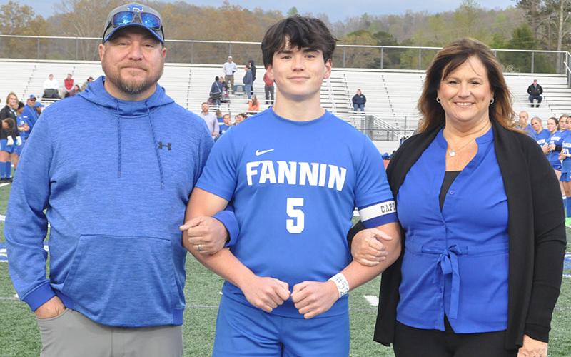 Fannin County High School recognized senior soccer player Turner Michael Friday. Michael is shown with his parents, Perian Michael and Johnathon Michael.