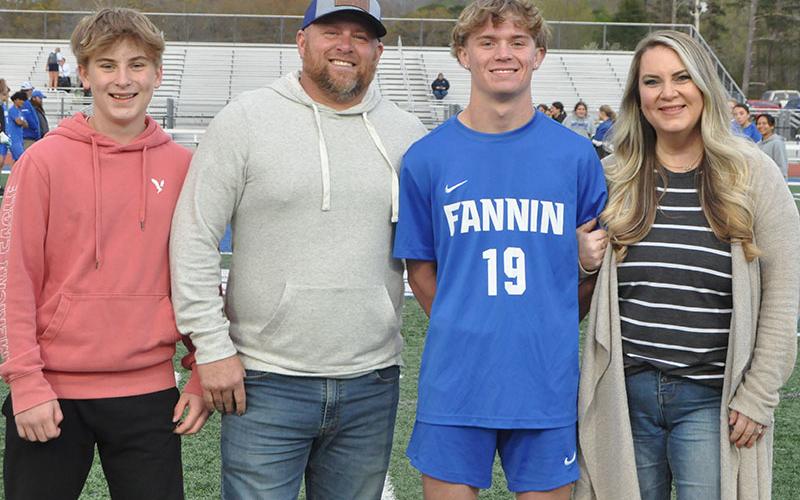 Blake Summers was recognized on Senior Night at Fannin County High School Friday evening, April 12. Shown with Summers are his father and mother, Trent Summers and Whitney Summers along with his brother.