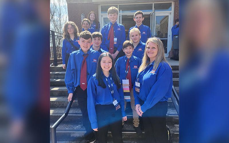 Fannin County Middle School students smile after a successful STEM competition. From left, front row, Lyla Strange, and Michelle Champion; second row, Ashton Carder and William Hood; third row, Conner Reddin and Karleigh-Jayne Stiles; fourth row, Jordie Hennessey, Aric Carder and Ellijah Ensley; and in back, Alexa Hawkins.