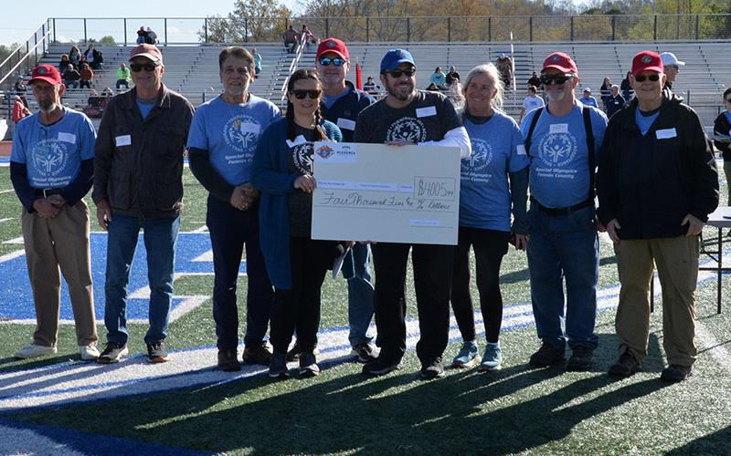 The Knights of Columbus Blue Ridge Council 12126 presented $4,005.94 to Fannin County Special Olympics at the start of the track and field events at the high school football stadium last week. The money was raised in cooperation with La Pizzeria when the restaurant off Forge Mill Road celebrated its Grand Reopening Thursday, April 11. All proceeds from the event, as well as tips and donations went to Special Olympics.