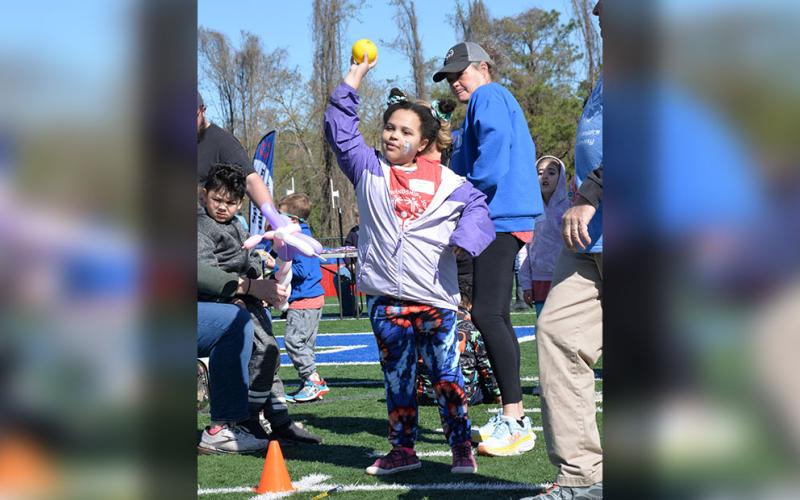 Seasame from Blue Ridge Elementary School shows off winning softball throw form.