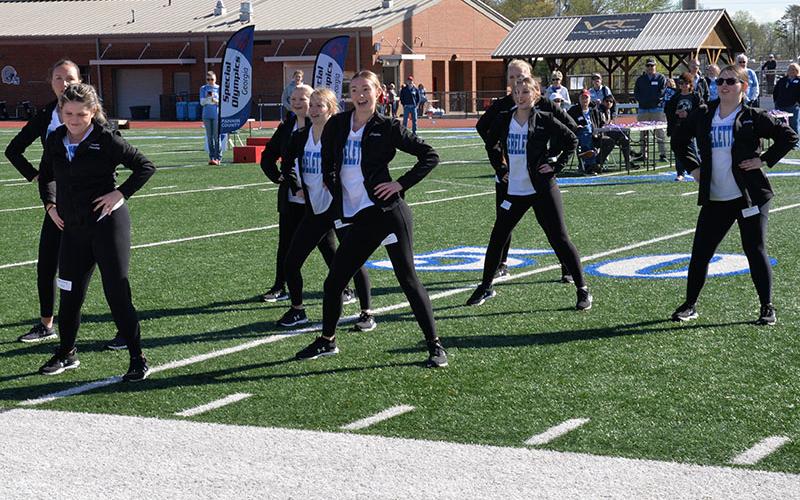 The Fannin County High School Rebelettes Dance Team entertained then helped the athletes during the Special Olympics Track and Field event. Shown during opening ceremonies are, front left to the back: Parker Stanley, Eva Mcnelley, Caylee Gaddis, Addie Lester, Emily Dickey, Callie Lewis, and Ragna Moeller.