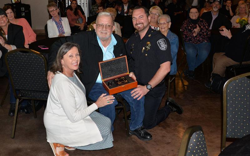 City Clerk Nancy Godfrey and Police Chief Michael Earley presented Thomas Seabolt something he never needed during his years as mayor, a gavel.