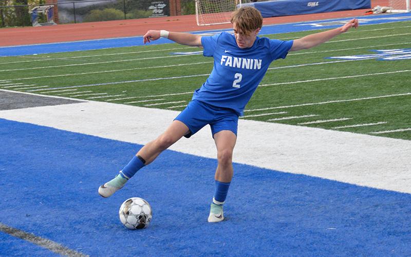 Finn Thoresen works to keep the ball in play when Fannin County hosted Fellowship Christian.