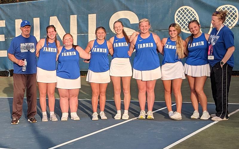 Coach Mark Miller, Maddie Schueneman, Kendra Newman, Izzie Jabaley, Anna Beth Minear, Kendall Clore, Lucia Martinez, Sydney German, and Coach Suzanne Pass, from left, are shown after the win over North Cobb Christian.