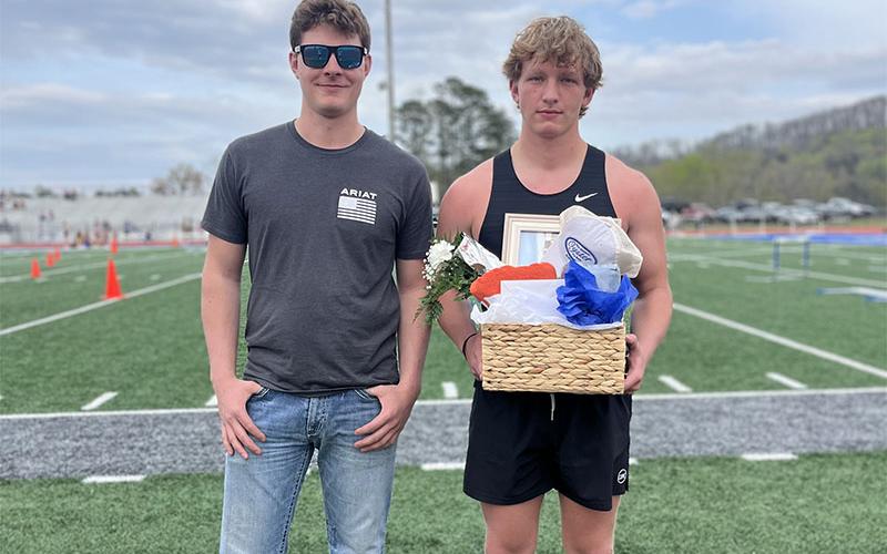 Members of Fannin County High School’s Track and Field teams were honored between matches last week. Karter Green holds his awards.