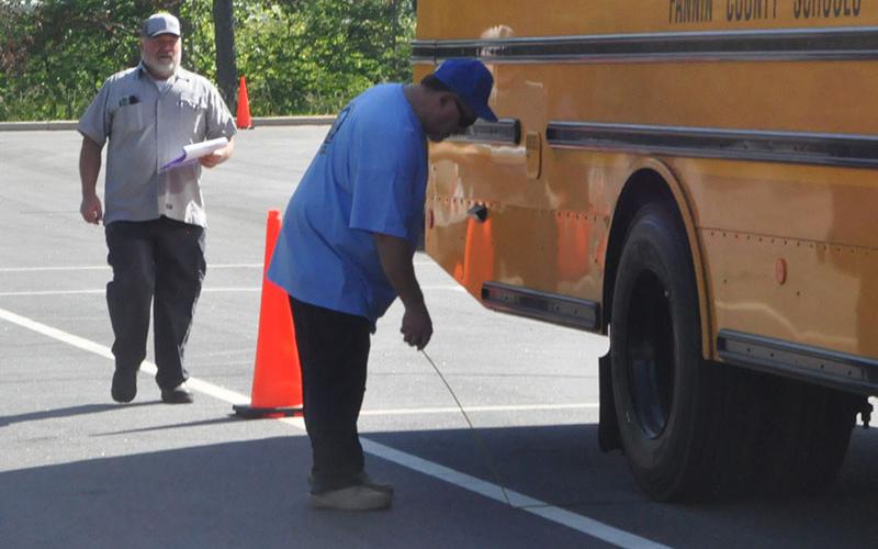 In the parallel parking test, drivers were scored by their distance away from the “curb” line .