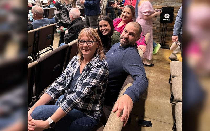 Tyechia Ledford has visited The Ridge church almost every Sunday since being released from the Fannin County Detention Center. She is sitting with one of the detention center’s officers from the jail, Craig Perkins. From left, Donna Perkins, Perkins, Madison Ponton, and Ledford.