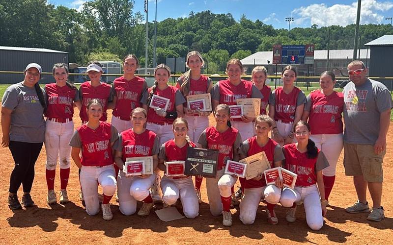 Copper Basin’s Lady Cougars celebrated after winning the District 5A Softball Championship. Shown following the title game are, from left, front,  Addison Hyatt, Angela Graves, Caitlin Pack, Taylee Hall, Riley Hall,  and Addison Croft; and, back, Coach Lindsey Hyatt, Emily Mundy, Maggie Scoggins, Samantha Ware, Riley Akens, Alexis Hyatt, Claire Ledford, Abbi Hayes, Bella Messer, Brooklyn Mason, Coach Jeremy Pittman.
