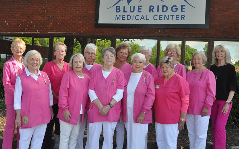 News Observer photo The Pink Ladies at Blue Ridge Medical Center were honored last week for a combined 26 years of volunteer service at the hospital. In front of Blue Ridge Medical Center before the Hospital Authority’s quarterly meeting are, from left, front, Shirley Copeland, Pat Quinn, Barbara Cheatham, Laura Haight, and Wanda Patterson; and, back, Louiza Whittaker, Maureen Dalziel, Jean Bonnewitz, Rita Oberle, Carole Thomas, Becky Guthrie, Joyce Mitchell, and Susan Kiker.
