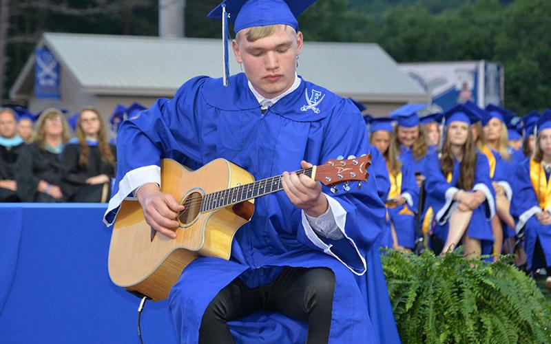 A Fannin graduate performing for fellow students.