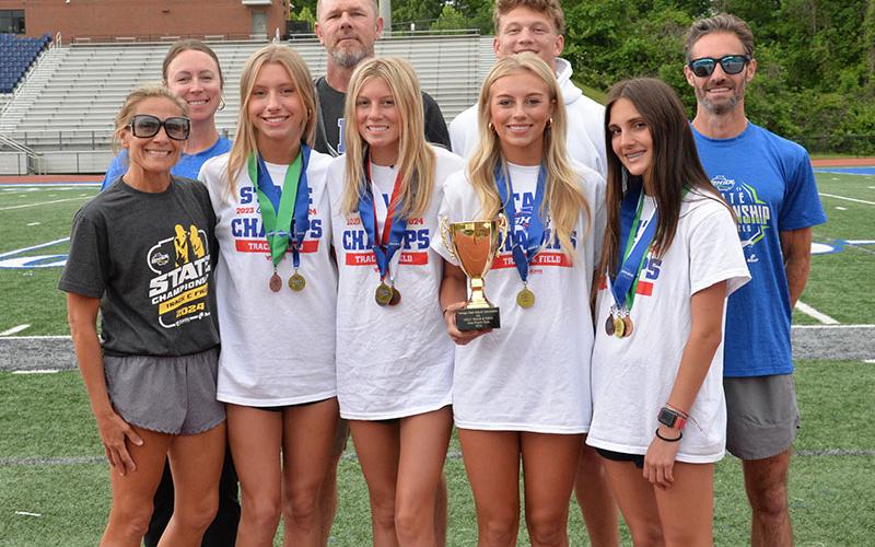 Fannin County High School track &amp; field coaches were very proud of each of the athletes who received medals. Shown back at the Fannin County High School track following the weekend success were, from left, front, Coach Miranda Roof, Ava Acker, Lindsey Holloway, Carlee Holloway, Karli Sams; and, back, Coach Alden Falls, Coach Jeff Kuna, Cooper Born, Coach Dr. Lucas Roof. The Holloways, Acker and Sams make up the 4x800 meter relay team that brought home a state championship.