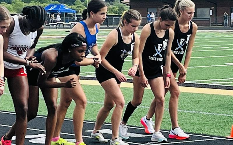Fannin County’s Karli Sams and Lindsey Holloway are shown at the start of the 1600 meter run in Sectional Meet competition this past weekend. Ten Fannin County High School athletes earned spots in the State Championships this weekend as a result of their performances.