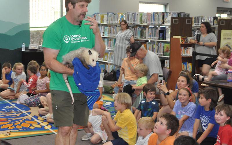Roy from ZooPro Adventures carried around an opossum for the children to look at as they learned all about the local marsupial.