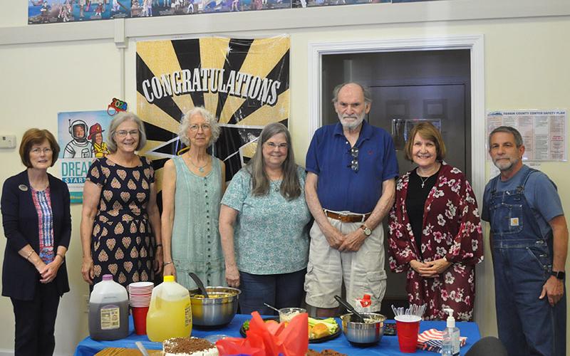 FLAG tutors were honored for their dedication and time spent helping others. Shown from left is, Director Teresa Ross, board member Carol Crawford, Executive Director Jill Key, board member and tutor Donna Earl, tutor Ed Wolpert, tutor Jeanette Rismiller, and board member and tutor Alan Schulman. Not pictured are tutors, Dawn Harding, Kathy Barber, and Ann Brayley.