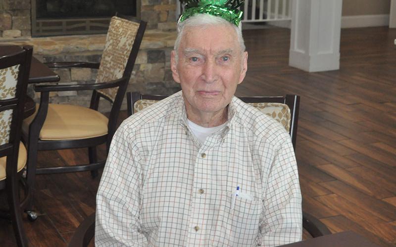 Bill Langford has a kind spirit and keeps a smile on his face. He celebrated his 99th birthday with Hatchell and Langford.