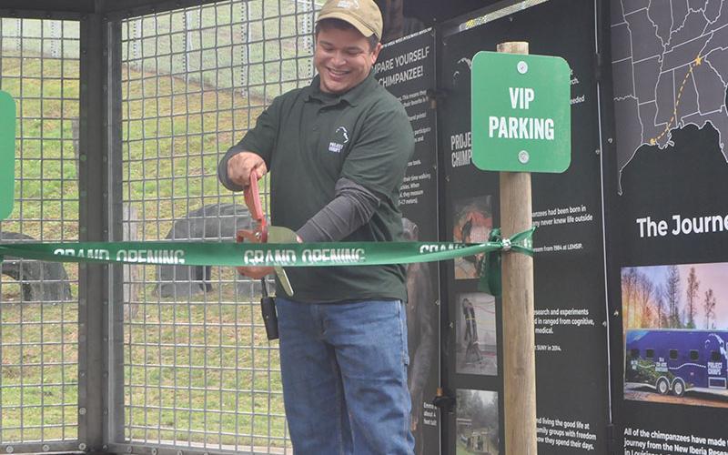 Project Chimps Facilities Manager Rodney Newberry cut the ribbon for the new habitat at the facility. It encompasses is over two acres with only fencing so chimps can see out into the world around them.