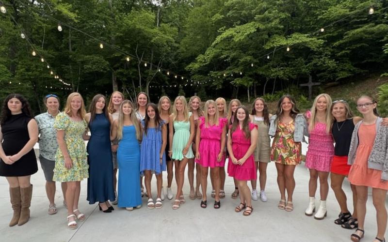 Members of the Fannin County High School Track &amp; Field girls team are shown with their coaches.