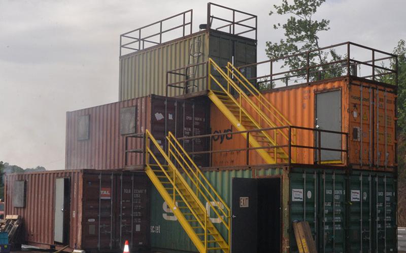 The Fannin County Fire Department’s burn building, constructed of used shipping containers, offers firefighters real world experience at battling a fire. Various scenarios can be created inside the building for students to overcome.