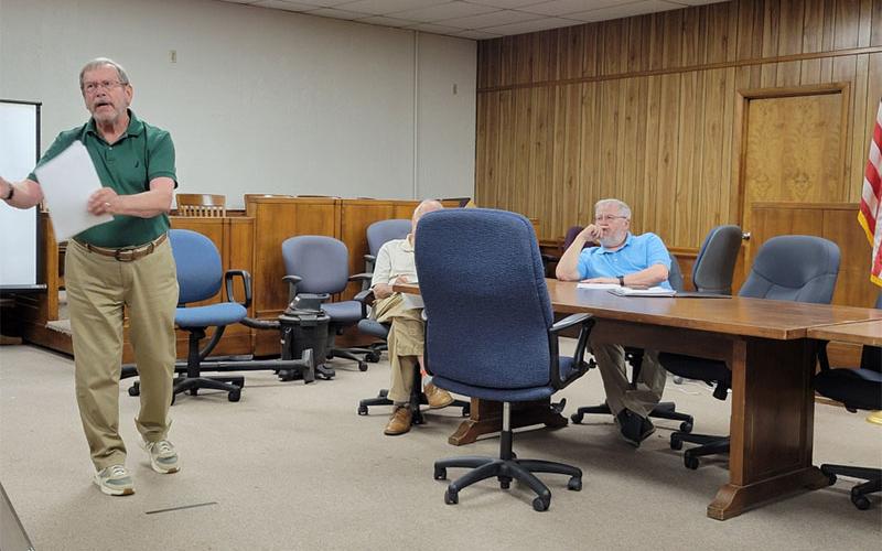 Paul Wright talks about the Ocoee Whitewater Center as Polk County IED Board member Buddy Haynes listens.