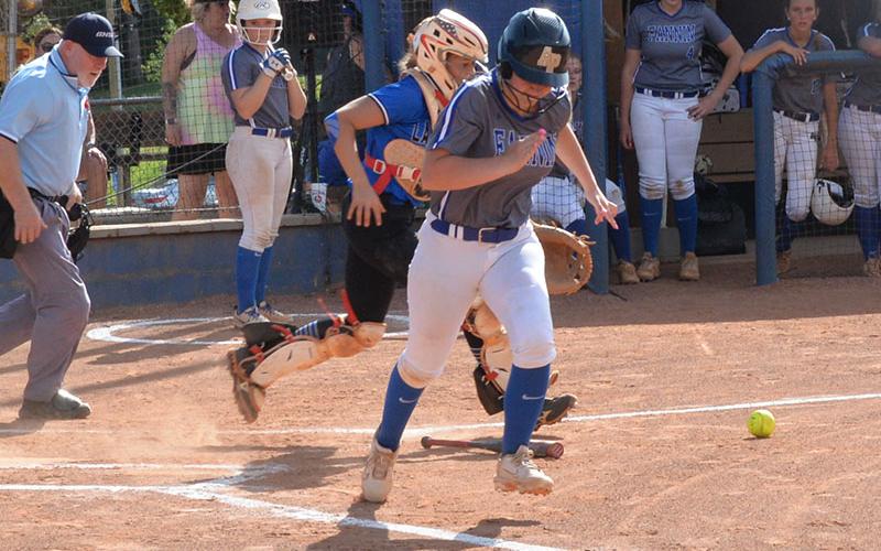 Megan Davis laid down a perfect bunt to get on base for the Lady Rebels against the Towns County Lady Indians in softball action last Thursday.