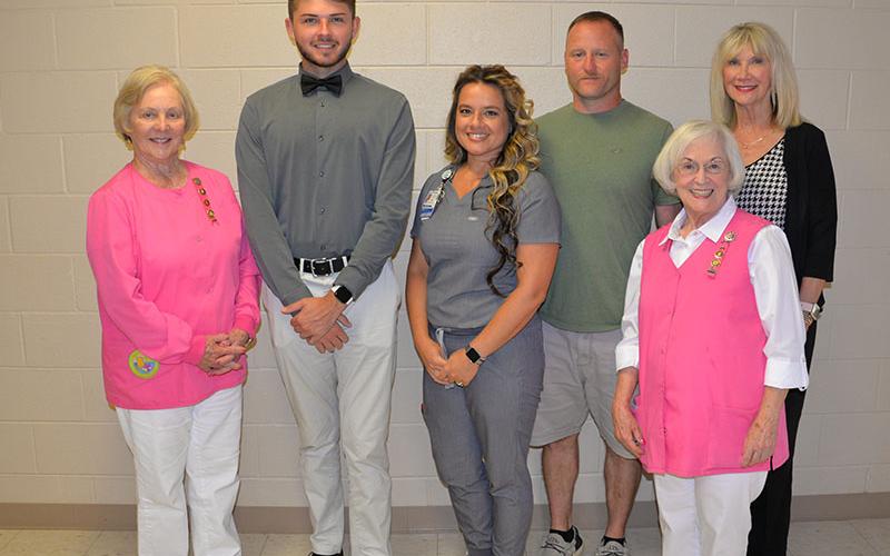 The Blue Ridge Medical Center Auxiliary, the Pink Ladies, presented three $1,000 scholarships to students during a special ceremony last week. Among those taking part were, from left, Joyce Mitchell, Trevor Couch, Shelley Stiles, Dale Stiles, Shirley Copeland, and Susan Kiker.
