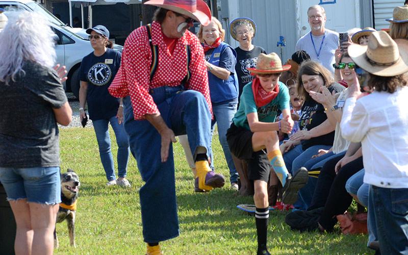 Eli, right, won the Most Enthusiastic Cowboy award after showing off his dancing skills during the rodeo sneak preview for Special Olympics athletes at the Kiwanis Club Fairgrounds in Blue Ridge.