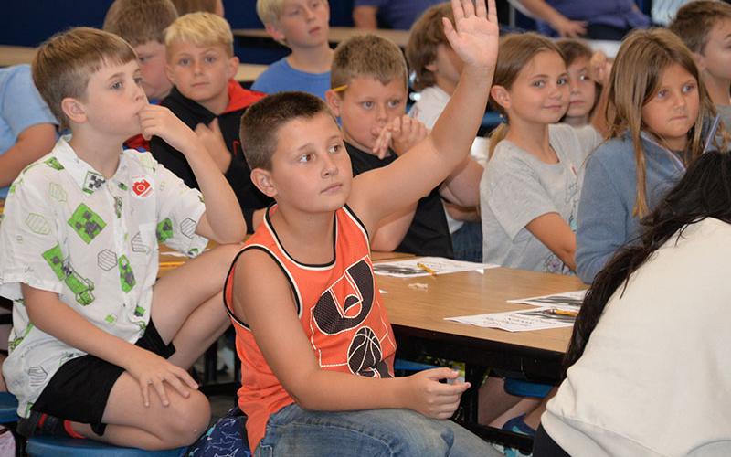 Bentley Phillips had a question during a flag etiquette class taught by members of the North Georgia Honor Guard at Blue Ridge Elementary.